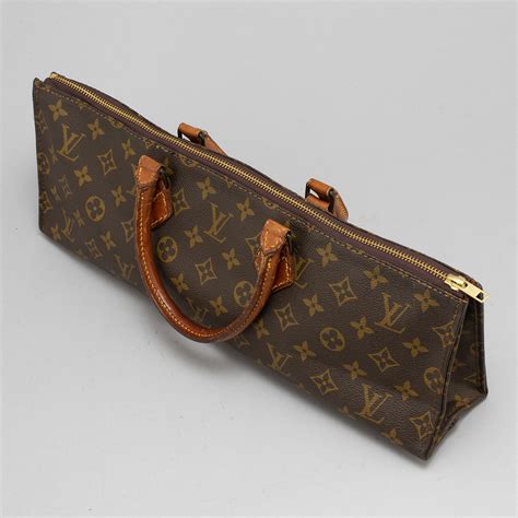 triangle louis vuitton bag|Louis Vuitton sac triangle bag.